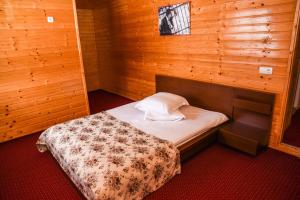 Ένα ή περισσότερα κρεβάτια σε δωμάτιο στο Colț Viu Cabana