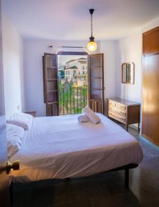 Postel nebo postele na pokoji v ubytování Apartamento Balcones del Tajo