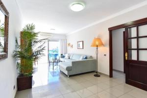 Posteľ alebo postele v izbe v ubytovaní Luxury BeachFront Mogan