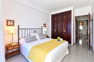 Posteľ alebo postele v izbe v ubytovaní Luxury BeachFront Mogan
