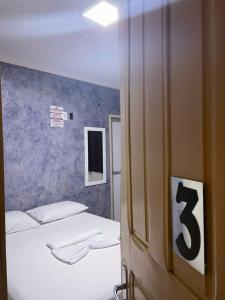 Posteľ alebo postele v izbe v ubytovaní Pousada Pilotos