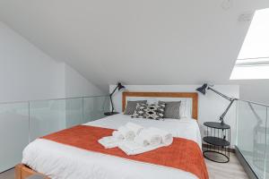 Postel nebo postele na pokoji v ubytování JM VILLAGE APARTMENTS