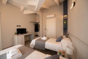 Posteľ alebo postele v izbe v ubytovaní Bed and breakfast Ma.Gi.A + 37 fotografií