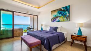 Letto o letti in una camera di Marboka Hotel & Suites