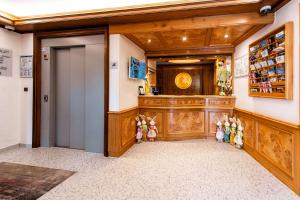 a group of stuffed animals standing in a room at Best Western Plus Au cheval Blanc à Mulhouse in Baldersheim