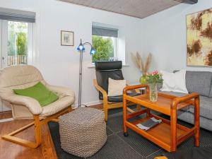 A seating area at 4 person holiday home in Nordborg