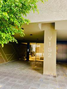 a building with the word vosa on the side of it at APART Caballito II in Buenos Aires