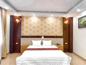 Postel nebo postele na pokoji v ubytování An Khang Hotel