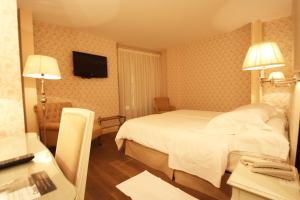 Ένα ή περισσότερα κρεβάτια σε δωμάτιο στο Las Doñas del Portazgo