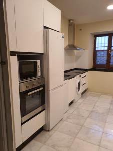 Kuchnia lub aneks kuchenny w obiekcie Habitaciones Casa Sevillana Centro