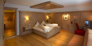 Letto o letti in una camera di Alpenhotel Ernberg