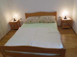 Postel nebo postele na pokoji v ubytování Apartment Prpic