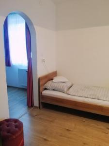 Postel nebo postele na pokoji v ubytování szt.flórián