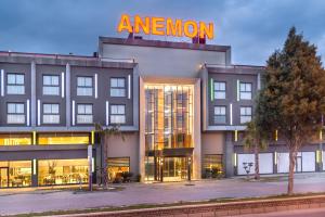 a building with a amazon sign on top of it at Anemon Kent Aydın Otel in Aydın