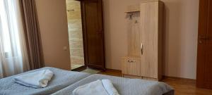 Letto o letti in una camera di Lisaneli