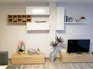 A television and/or entertainment centre at Rancho A 112