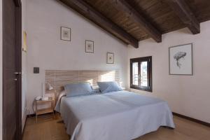 Łóżko lub łóżka w pokoju w obiekcie Casa Di Anna - Fattoria Sociale