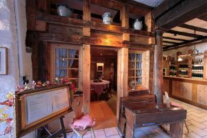 a dining room with a table and a room with a tableablish at Domaine Jean Sipp in Ribeauvillé