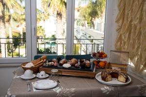 a table with a tray of food on top of it at Leon D'Oro in Corleone