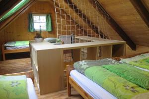 Posteľ alebo postele v izbe v ubytovaní Apartments Skiareál U Vodárny Bedřichov