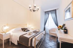 Postel nebo postele na pokoji v ubytování Albergo Giardino