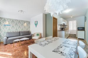Posteľ alebo postele v izbe v ubytovaní Miralmar Apartamento