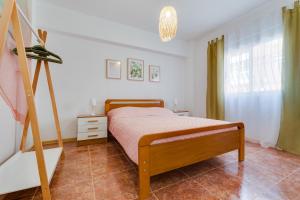 Posteľ alebo postele v izbe v ubytovaní Miralmar Apartamento