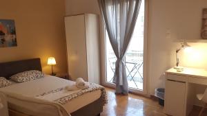 Posteľ alebo postele v izbe v ubytovaní Petrol Apartment- Athens Center, 4 BD, 1 BATH