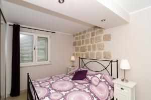 Posteľ alebo postele v izbe v ubytovaní Apartments Gaura