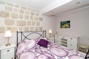 Posteľ alebo postele v izbe v ubytovaní Apartments Gaura