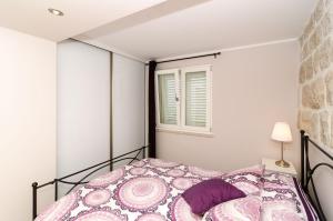 Posteľ alebo postele v izbe v ubytovaní Apartments Gaura