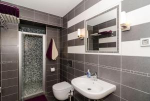 Kúpeľňa v ubytovaní Apartments Gaura