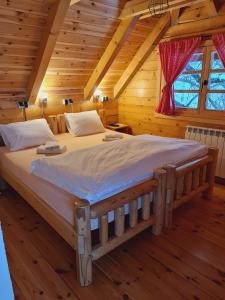 Postel nebo postele na pokoji v ubytování ethno village Bijeli Potok