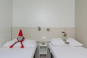Salve Croatia Mobile Homes in Amadria Park Trogir客房内的一张或多张床位