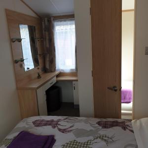 Postel nebo postele na pokoji v ubytování Deer lodge