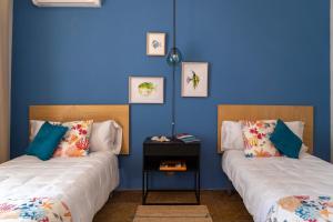 Postel nebo postele na pokoji v ubytování Hotel Aubí