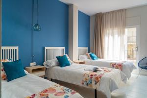 Postel nebo postele na pokoji v ubytování Hotel Aubí