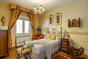 Giường trong phòng chung tại Waou Deluxe Cottage Titulcia