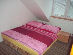 Postel nebo postele na pokoji v ubytování Penzion Apartmány Zlín