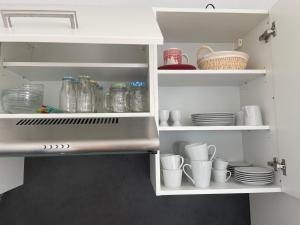 Eldhús eða eldhúskrókur á Skyloft Apartment Feldkirch