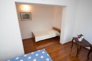 Posteľ alebo postele v izbe v ubytovaní Apartment in Duce with sea view, terrace, air conditioning, Wi-Fi (132-10)