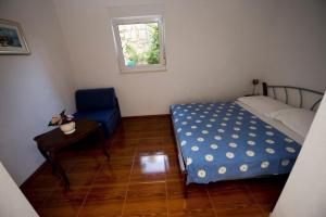 Posteľ alebo postele v izbe v ubytovaní Apartment in Duce with sea view, terrace, air conditioning, Wi-Fi (132-10)