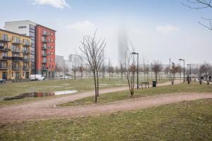 a park with trees and a path in a city at Apartments Malmö in Malmö