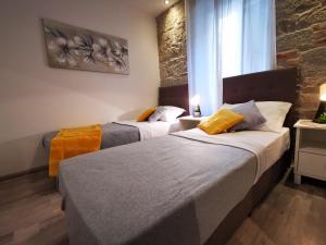Postel nebo postele na pokoji v ubytování Apartment Herc