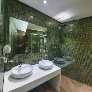 Ett badrum på Dream House Hotel & Spa