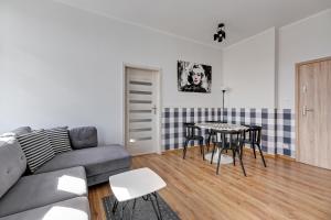 Część wypoczynkowa w obiekcie Blue Mandarin Apartments III Haffnera