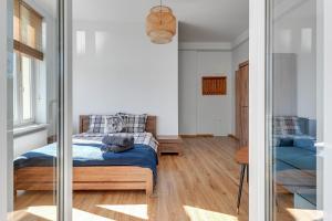 Łóżko lub łóżka w pokoju w obiekcie Blue Mandarin Apartments III Haffnera