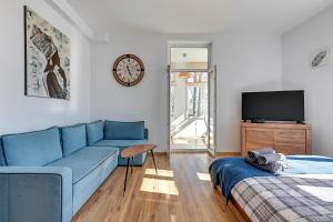 Łóżko lub łóżka w pokoju w obiekcie Blue Mandarin Apartments III Haffnera