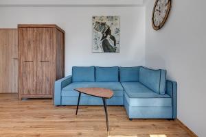 Część wypoczynkowa w obiekcie Blue Mandarin Apartments III Haffnera
