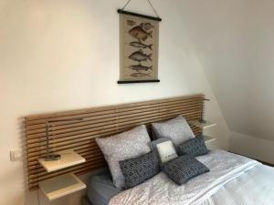 Postel nebo postele na pokoji v ubytování Appartement de charme rue du Château